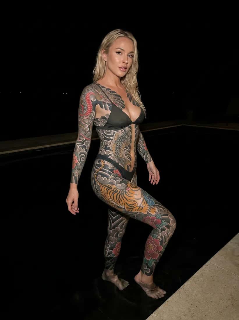 Japanese (Irezumi) tattoo idea on a woman — pool black water night
