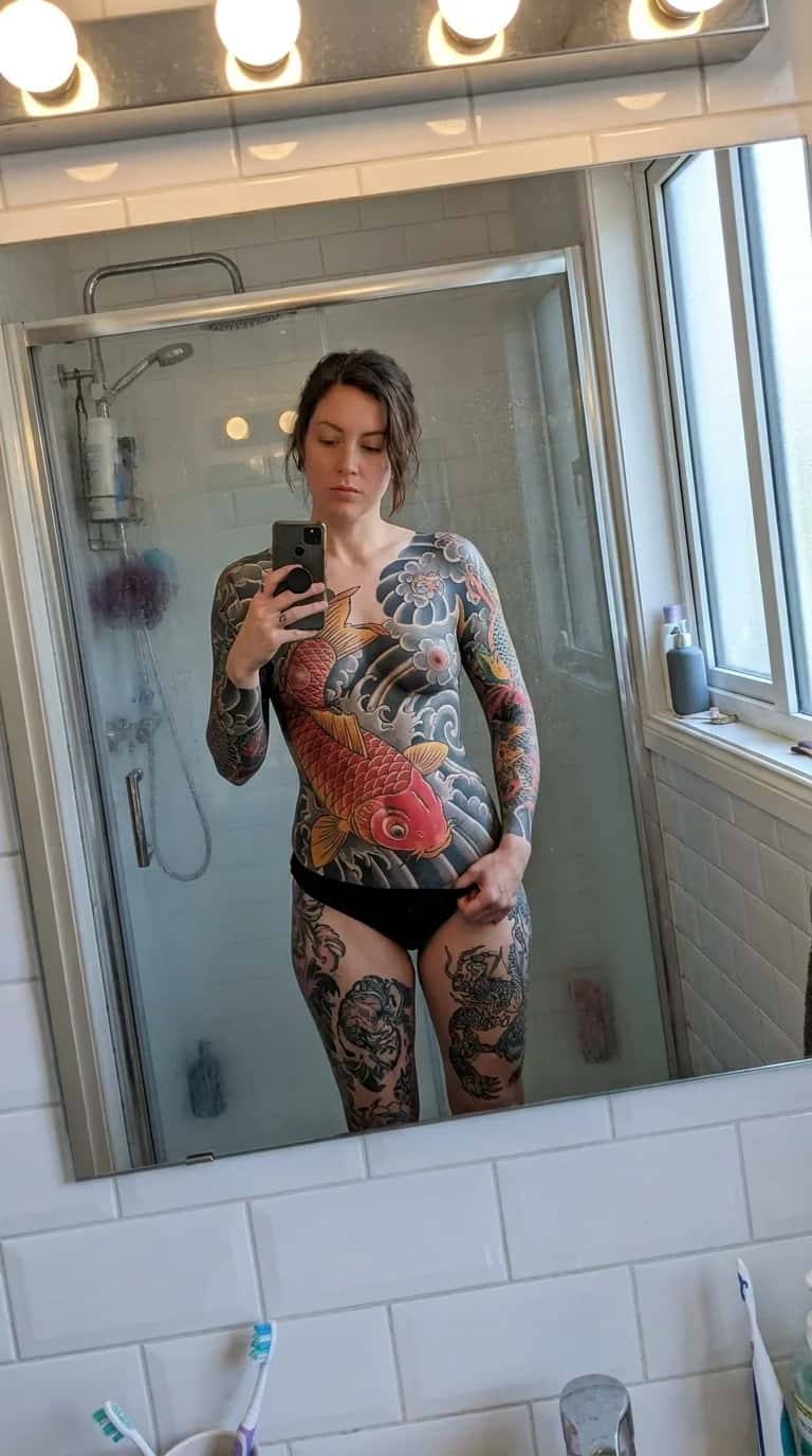 Japanese (Irezumi) tattoo idea on a woman — mirror bathroom