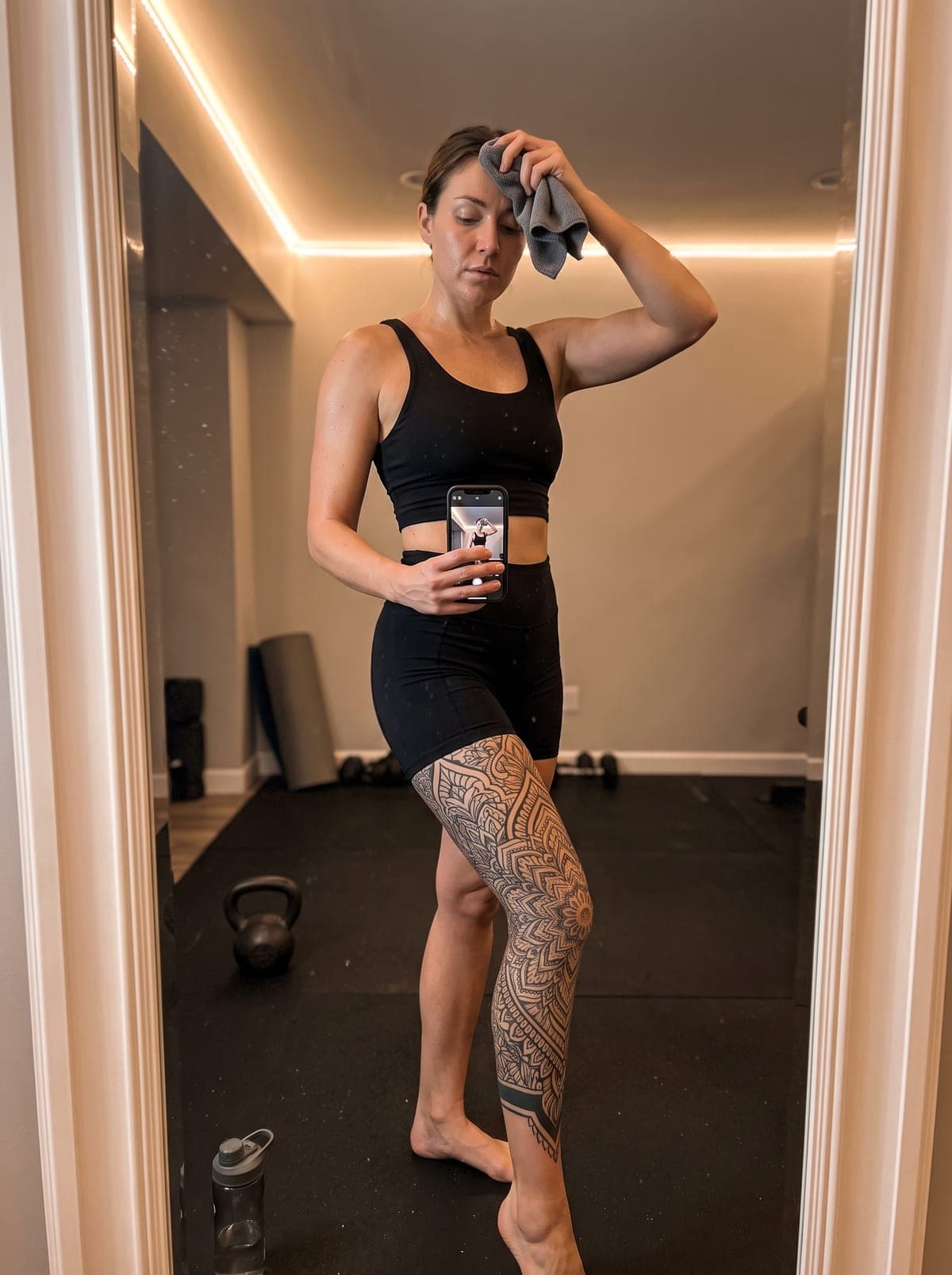 Blackwork leg tattoo — full leg piece from hip to ankle