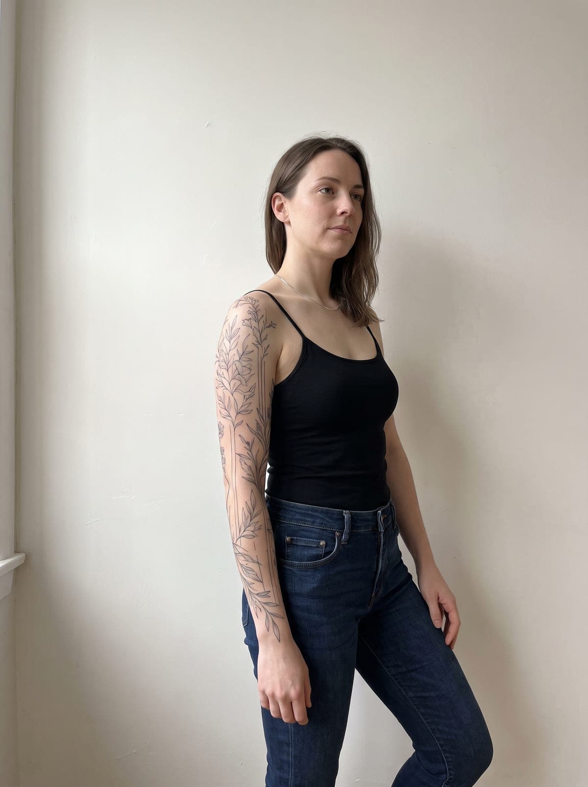 Fine Line sleeve tattoo — full-sleeve from shoulder to wrist, wrapping fully around the arm