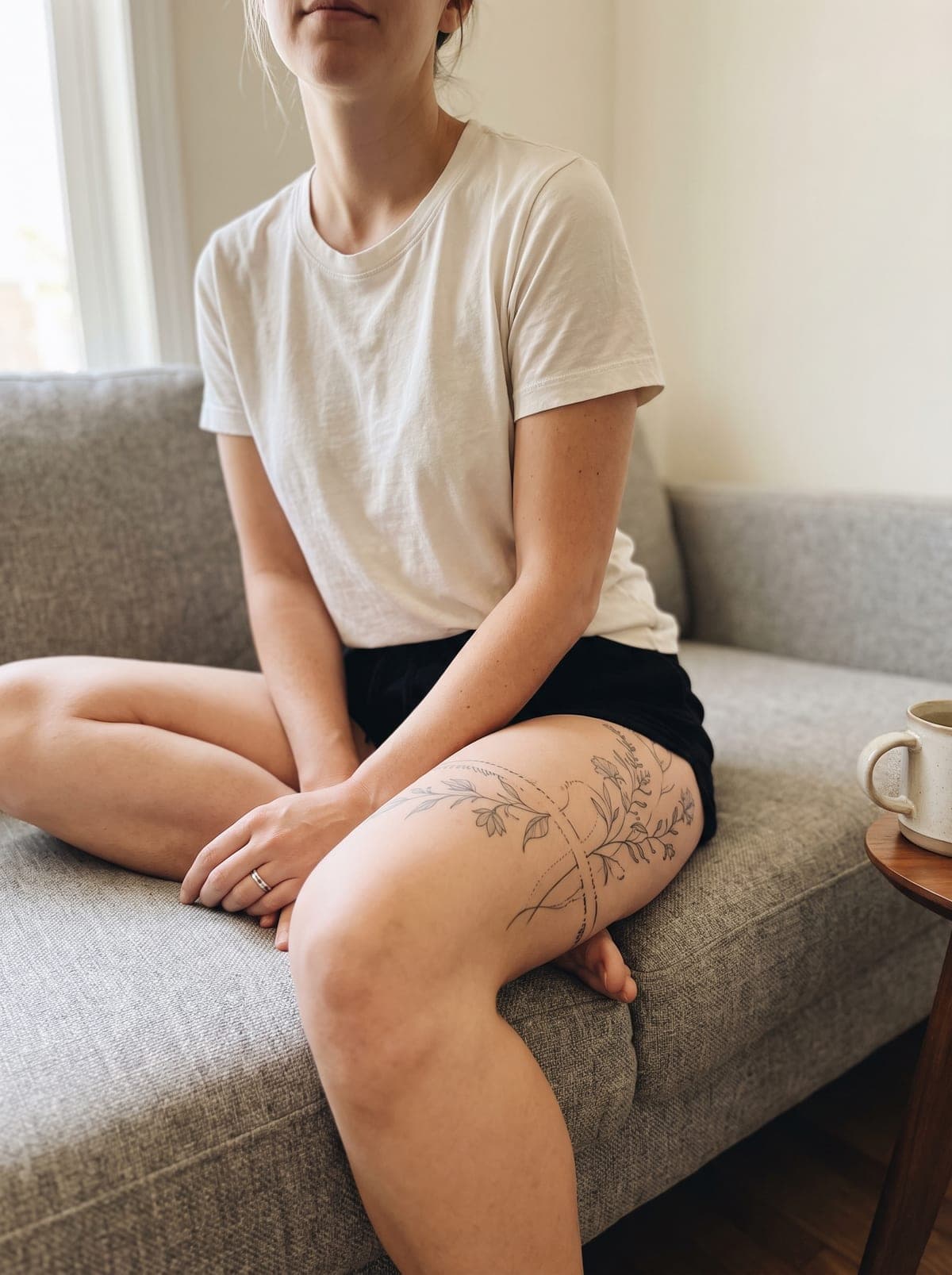 Fine Line thigh tattoo — thigh piece from hip to above the knee