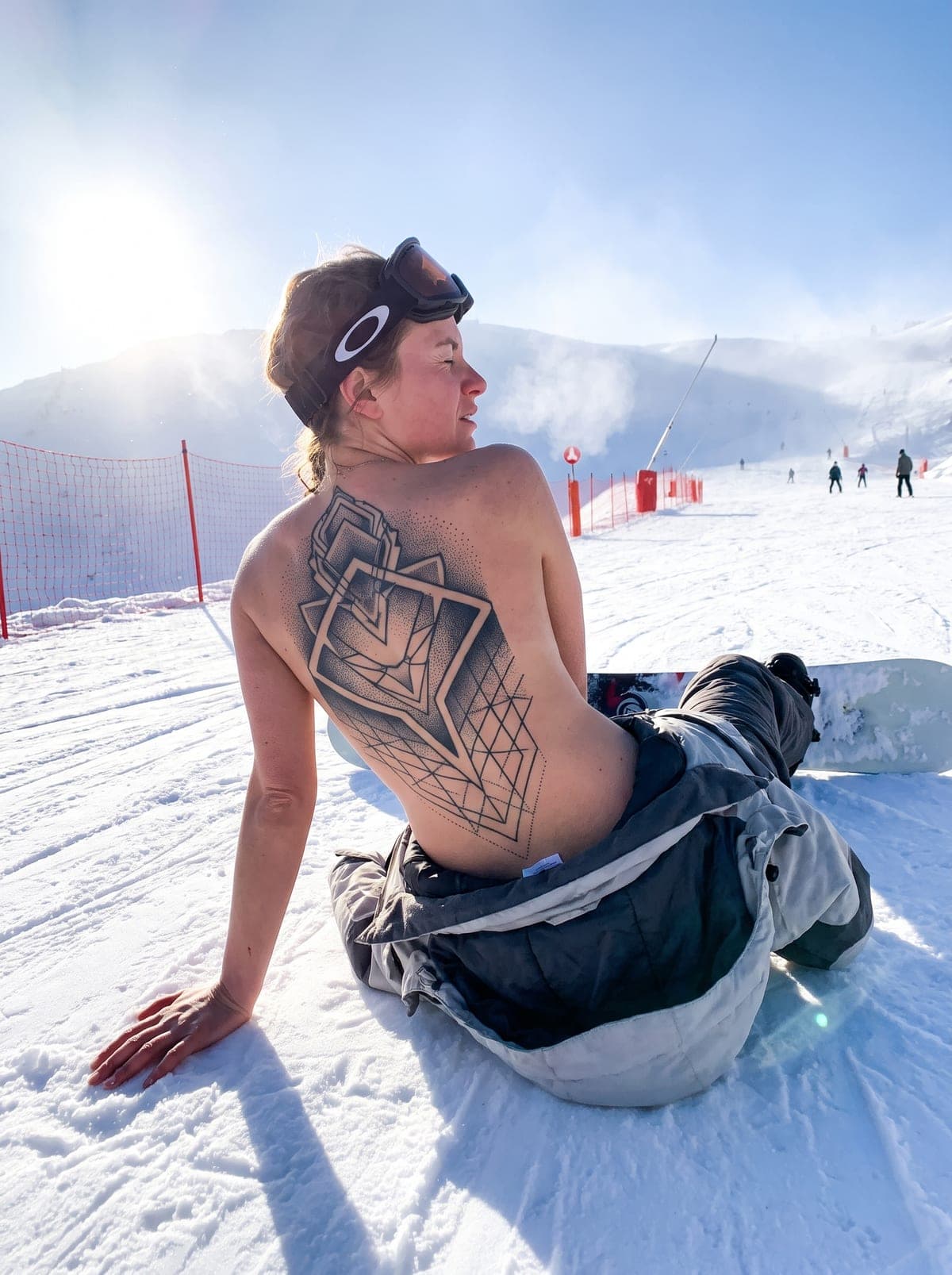 Geometric back tattoo — full back piece spanning shoulder blades to lower back