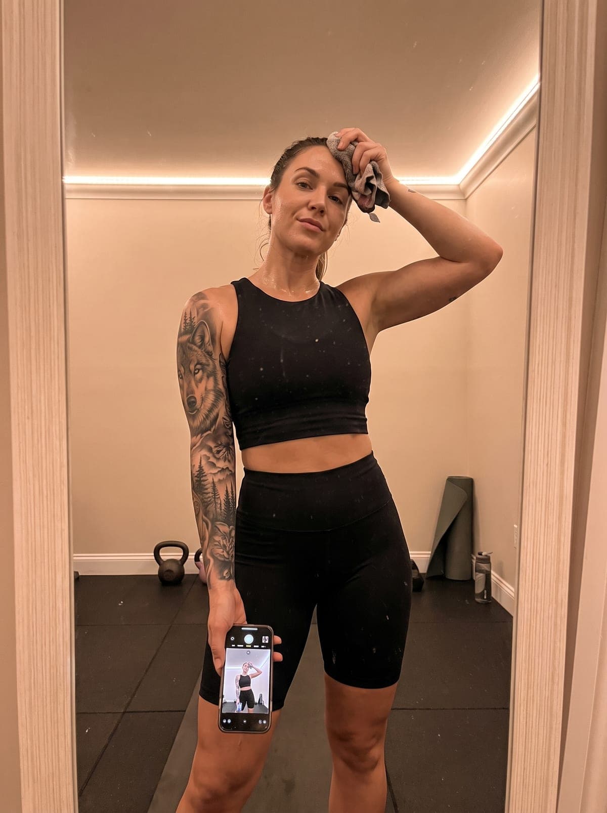 Realism sleeve tattoo — full-sleeve from shoulder to wrist, wrapping fully around the arm